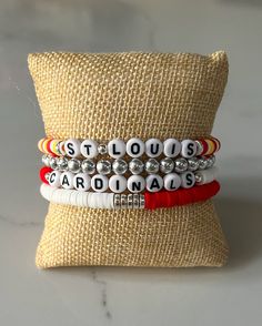 Made to order custom sports clay bead bracelets. Mix and match or you can order the entire set. These are made with high quality 6mm Heishi beads and high quality stretch cord. All bracelets are finished off with super adhesive jewelry glue.