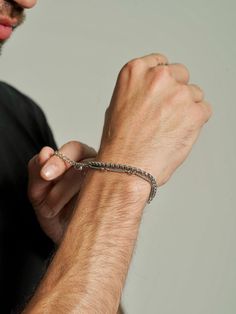 Introducing our Men's Rounded Box Chain Bracelet – a sophisticated two-strand piece combining a classic rounded box chain with a uniquely twisted chain. Durable and versatile, it's suited for both casual and formal looks, enhancing any outfit with a touch of masculine elegance. Adjustable Box Chain Cuban Link Bracelet, Adjustable Cuban Link Bracelet With Box Chain, Adjustable Box Chain Cuban Link Bracelet Gift, Minimalist Cuban Link Bracelet With Box Chain, Modern Adjustable Cuban Link Bracelet With Box Chain, Modern Adjustable Cuban Link Box Chain Bracelet, Gift Cuban Link Box Chain Bracelet, Chain Bracelet Men, Masculine Elegance