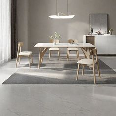 a white table and chairs in a room