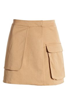 Show off your stems in this front-wrap miniskirt designed with a cargo pocket for a utilitarian vibe. 15" length (size Medium) True wrap style with hook-and-bar closure Cargo flap-bellows pocket Unlined 65% recycled polyester, 35% polyester Machine wash, tumble dry Imported Utility Cotton Skort, Short Length, Spring Cargo Pocket Short Skort, Utility Cotton Skort In Short Length, Utility Style Cotton Skort, Cotton Mini Skort With Side Pockets, Mini Skort With Side Pockets In Cotton, Spring Short Skort With Cargo Pockets, Cotton Mini Skirt With Cargo Pockets, Short Cargo Skirt With Pockets For Work