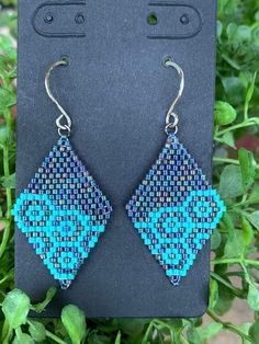 "Blue and turquoise geometric drop earrings.  2\" drop" Stitch Earrings, Brick Stitch Earrings, Grey Beads, Stitch Ideas, Earring Ideas, Beading Ideas, Pretty Bracelets, Triangle Earrings, Flower Bracelet