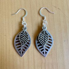 Nature is always in style when you've got these layered leaves on your lobes.  - 2" long - Nickel free ear wires - silver plated charms - comfortable for all day wear. Find more of my earrings here: https://www.etsy.com/shop/fatcatbeads?section_id=42122010 Thank you for shopping with me! View all of my items here: www.fatcatbeads.etsy.com Nickel-free Leaf-shaped Sterling Silver Earrings, Sterling Silver Leaf Earrings With Ear Wire, Nickel-free Nature-inspired Silver Earrings, Nature-inspired Nickel-free Silver Earrings, Silver Nature-inspired Nickel-free Earrings, Silver Nickel-free Nature-inspired Earrings, Nickel-free Leaf-shaped Nature-inspired Earrings, Silver Leaf-shaped Metal Earrings, Adjustable Silver Nature-inspired Earrings