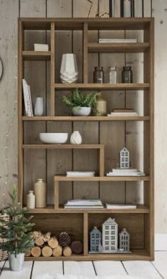 a wooden shelf filled with lots of different types of items on top of each other