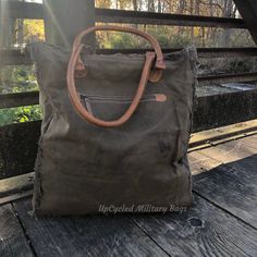 "Infantry Soldier Weekender Tote Bag made of Repurposed Military Canvas and CowHide with leather accents. Hair on Hide and UpCycled Canvas combined to make this gorgeous Large Weekender Tote that's made of repurposed military tent and tarp canvas. A classy, and impressive Bag ready for an overnight escapade, a day on the run, or to carry everything you need for an active life on the go. Great as a Military Mom or Wife gift. Purse * Large Tote * Shoulder Bag * Weekender DETAILS * Size: 16\" x 18\ Waxed Canvas Bags With Leather Trim For On-the-go, On-the-go Satchel Bag With Leather Trim, Leather Canvas Bag With Large Capacity For On-the-go, Canvas Hobo Satchel Bag For Errands, Waxed Canvas Crossbody Bag For On-the-go, Leather Trim Hobo Tote Bag For On-the-go, Canvas Satchel Hobo Bag For Errands, Brown Canvas Hobo Bag For Travel, On-the-go Hobo Bag With Adjustable Strap