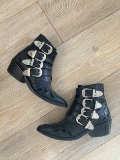 (eBay) Find many great new & used options and get the best deals for Toga Pulla Four Buckle Western Leather Black Boots Size 35-1/2 at the best online prices at eBay! Free shipping for many products! Black Western Boots With Buckle Closure, Vintage Ankle Boots With Buckle Closure, Vintage Moto Boots With Leather Footbed For Fall, Vintage Ankle Moto Boots With Buckle Closure, Vintage Fall Moto Boots With Leather Footbed, Western Boots With Buckle Closure And Pointed Toe, Leather Moto Boots With Buckle Closure And Pointed Toe, Vintage Leather Moto Boots With Pointed Toe, Vintage Moto Ankle Boots With Leather Footbed