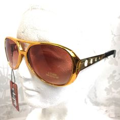 Elvis Rock & Roll Gold Glasses Complete Your Elvis Costume With These Gold Costume Sunglasses 50's - 60's Rock Star Gold Celebrity Sunglasses Uv 400 Great For Daily Use - Christmas Parties - Retro Look - Halloween Parties - Costume Parties Retro Gold Sunglasses With Glass Lenses, Vintage Glass Aviator Sunglasses For Summer, Vintage Aviator Sunglasses For Summer, Retro Glass Sunglasses For Party, Retro Glass Sunglasses For Parties, Retro Party Sunglasses With Glass Lenses, Retro Gold Sunglasses With Mirrored Lenses, Gold Retro Sunglasses With Mirrored Lenses, Retro Gold Aviator Sunglasses With Mirrored Lenses