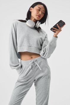 Stay seriously comfy from studio to street to lounge. The Muse Hoodie is made with a soft ribbed knit and has a relaxed, cropped silhouette and slits at sides. Pair it with the matching sweatpant to master off-duty. Cozy Ribbed Cropped Sweater In Relaxed Fit, Cozy Stretch Ribbed Cropped Sweater, Ribbed Cropped Sweater For Fall Loungewear, Cozy Ribbed Cropped Sweater For Loungewear, Comfortable Hoodie With Ribbed Cuffs For Lounging, Cozy Fit Athleisure Hoodie For Loungewear, Oversized Ribbed Cropped Sweater For Loungewear, Cozy Fit Hoodie With Ribbed Waistband For Loungewear, Casual Stretch Ribbed Hoodie