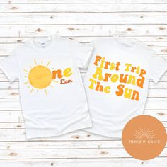 You will love this first trip around the sun theme shirt! It will make for the perfect outfit for your littles ones special day! Please type in the box what you would like the custom words to say, for example (Mama, daddy, dad, aunt, brother, or One with your little ones name!) Summer Birthday Pre-shrunk T-shirt, Pre-shrunk Summer Birthday T-shirt, Funny Print Tops For First Birthday In Summer, First Birthday Summer T-shirt With Crew Neck, Fun Summer T-shirt For First Birthday, Yellow Tops For Summer Birthday, Custom Printed T-shirt For First Birthday In Summer, Family Matching Birthday T-shirt For Summer, White T-shirt For First Birthday In Summer