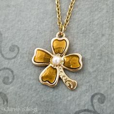 Flower Necklace SMALL Yellow Flower Charm Flower Jewelry Gardening Garden Jewelry Flower Girl Neckla Metal Flower Necklace For Gift, Gold Metal Flower Necklace As Gift, Gold Flower Shaped Nickel Free Necklace, Gold Metal Flower Necklace For Wedding, Wedding Necklaces With Flower Charm In Metal, Wedding Necklace With Flower Charm In Metal, Gold Jewelry With Flower Charm For Bridesmaid Gift, Nickel Free Gold Necklace For Bridesmaid Gift, Nickel-free Gold Necklace For Bridesmaid Gift