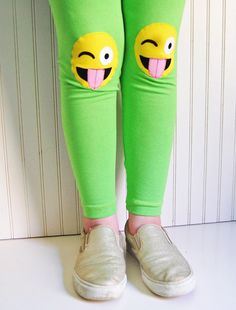 {DESCRIPTION} These fun and functional knee patch leggings are not only adorable, but they are made to last. Made with bright apple-green, medium-weight cotton lycra, these leggings are reinforced at the knees with yellow, crazy face emojis to protect your kiddo's delicate knees from playground wear and tear. Please note these leggings are handmade and some slight variation may occur. Leggings have an elastic non-roll waist band for a comfortable fit. Perfect for your emoji-obsessed kiddo! Meets Playful Elastic Bottoms For Spring, Playful Fitted Pants For Playtime, Fun Cotton Bottoms For School, Cute Stretch Bottoms For Playtime, Playful Bottoms For School In Spring, Playful Fitted Bottoms For Playtime, Cute Green Cotton Bottoms, Cute Fitted Pants For Playtime, Playful Fitted Playtime Bottoms