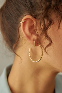 An uninhibited hoop meant to match your expressive attitude. Solid on its own, or as the perfect layering piece to your ear game. Style Inspiration Minimalist, Pave Ear Cuff, Radial Pattern, Double Piercing, Sterling Silver Jewelry Earrings, Diy Jewlery, Earrings Aesthetic, Dark Side Of The Moon, Sterling Jewelry