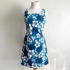 Vintage Jodi Kristopher blue hibiscus floral print Hawaiian dress. Zips up the back. White trim on the neckline. Dress has stretch. Please use measurements for sizing accuracy as vintage sizing typically runs small. Overall length is 33 inches.  Hawaiian, tropical, vacation, resort wear, cruise wear, vintage, retro, mini dress, VSCO, surfer, skater, beachy, floral, casual, bright Fitted Tropical Dress With Floral Print, Fitted Summer Dress With Hibiscus Print, Fitted Tropical Dress With Hibiscus Print, Fitted Hawaiian Dress With Tropical Print, Blue Fitted Tropical Dress, Fitted Tropical Mini Dress With Floral Print, Fitted Tropical Hibiscus Print Dress, Blue Fitted Hawaiian Dress, Fitted Sleeveless Mini Dress With Tropical Print