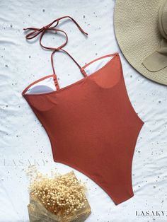 Lasaky - High Cut One Piece Swimsuit with Drawstring Ruched Trim and Criss Cross Neckline - Womens Swimwear in Elegant Brown - Premium Womens Clothing Summer Solid Color Bodysuit With Tie Back, Brown Backless Swimwear For Summer, Brown Backless Swimwear For The Beach, Summer Backless Swimwear With Drawstring, Stretch Tie Back Bodysuit For Beach, Stretch Tie-back Bodysuit For Beach, Stretch Bodysuit With Tie Back For Beach, Brown One-piece Swimwear For Summer, Solid Color Summer Bodysuit With Halter Neck