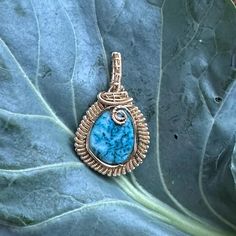 Blue moon turquoise has a stunning blue color that will truly pop when worn. This stone has been highly coveted since the earliest civilizations. It was thought to bring good fortune to those who carry it. It is also the birth stone of the month of December! As with all my work, this piece was handmade with love in the USA! Turquoise Teardrop Wire Wrapped Jewelry, Wire Wrapped Round Pendant Amulet Jewelry, Wire Wrapped Round Pendant Amulet, Handmade Teardrop Turquoise Necklace As Gift, Handmade Teardrop Turquoise Necklace For Gifts, Bohemian Teardrop Pendant Hand Wrapped Jewelry, Bohemian Teardrop Pendant Jewelry, Bohemian Hand Wrapped Teardrop Pendant Jewelry, Turquoise Wire Wrapped Round Jewelry