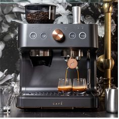 an espresso machine is being filled with coffee