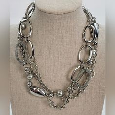 Silver-Tone Multi Chain Layered Necklace. 19in Lobster Clasp. Elegant Layered Metal Necklace With Silver Chain, Chic Silver Multi-strand Necklaces, Chic Multi-strand Silver Necklaces, Elegant Metal Layered Necklace With Beaded Chain, Elegant Layered Metal Necklace With Beaded Chain, Chic Silver Double Chain Necklace, Elegant Beaded Chain Layered Necklace, Chic Silver Necklace With Chain, Elegant Layered Beaded Chain Necklace