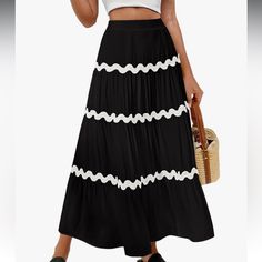 This Boho Skirt For Women Is Made Of Soft, Lightweight, Breathable And Skin-Friendly Fabric, Comfortable To Wear In The Hot Summer. Maxi Skirt Is Lined Inside Not See Through, Bohemian Style, Solid Color With Wavy Line Design, Long Flowy Skirts Above Ankle Length, Elastic Waist With Side Zip For The Perfect Fit. Summer Tiered Maxi Skirts Suit For Any Occasion. Whether It's A Leisurely Day At The Beach A Laid-Back Vacation Atmosphere, Or Dating. Black Ruffled Bottoms For Vacation, Bohemian Black Skirt For Day Out, Black Ruffled Skirt For Vacation, Black Skirt With Elastic Waistband For Beach, Black Maxi Skirt For Vacation, Black Long Skirt For Vacation, Black Skirt For Vacation, Black Tiered Skirt For Vacation, Black Spring Vacation Maxi Skirt