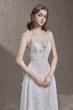 V-neck Lace Evening Dress For Prom Season, Feminine V-neck Lace Evening Dress, V-neck Lace Prom Gown, V-neck Gown With Lace Back For Prom, White V-neck Maxi Dress For Banquet, V-neck Evening Dress With Lace Back For Prom, Elegant V-neck Lace Dress For Gala, Elegant Lace V-neck Party Dress, V-neck Gown With Lace Trim For Party