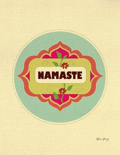 the name namaste is written in an ornate frame with flowers and leaves on it