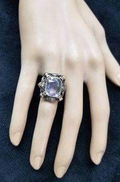 Gorgeous antique art deco filigree 18k yellow gold ring gray sapphire in cushion  shape circ 1900's center natural gray sapphire weight 10.35ct.  Size 13.5x9.5mm  very nice quality sapphire,Very nice medium gray color ,clean , very lively.the setting is gorgeously and tremendously old ring in excellent condition. Side set natural rose cut diamonds weight 0.45ct SI-HRing face  measured 20mm long 10mm widering size 6.5Resizable Retail value $9,500 net.Appraisal available Art Deco Jewelry With Rose Cut Round Diamonds, Art Deco Diamond Jewelry With Gemstone, Art Deco Rose Cut Round Diamond Jewelry, Heirloom Diamond White Gemstone Jewelry, Antique Cushion Cut Single Diamond Rings, Antique Cushion Cut Ring With Single Cut Diamonds, Antique Cushion Cut Rings With Single Cut Diamonds, Heirloom Emerald Cut Single Diamond Jewelry, Silver Sapphire Jewelry With Rose Cut Diamonds