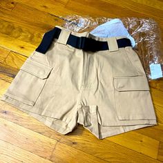 Fashion Nova Women Cargo Shorts New With Tags Size S Color- Tan Summer Khaki Cargo Shorts With Belt Loops, Khaki Cargo Shorts With Belt Loops For Summer, Summer Cargo Style Shorts, Summer Shorts With Cargo Pockets, Summer Cargo Shorts With Belt Loops, High Waist Cargo Style Summer Shorts, High Waist Summer Cargo Style Shorts, Casual Beige Shorts With Belt Loops, Summer High-waisted Cargo Shorts With Belt Loops