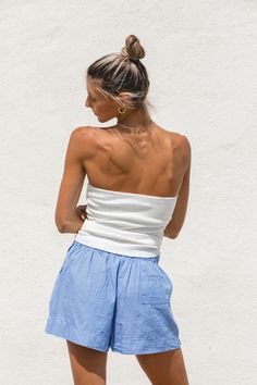 Expertly crafted with a ribbed knit, our High Noon Tube Top offers both comfort and versatility. Its long length provides ample coverage and pairs well with high-waisted bottoms. Perfect by itself or to layer under a breezy button up, this white sweater tube top is a must-have for any wardrobe. Versatile Fitted Ribbed Bottoms, Cotton Bottoms With Seamless Construction For Loungewear, Cotton Seamless Loungewear Bottoms, Fitted Tops With Elastic Waistband For Loungewear, Stretch Ribbed Bottoms, Casual Seamless Beach Bottoms, Solid Ribbed Bottoms For Summer, Spring Cotton Ribbed Bottoms, Spring Ribbed Cotton Bottoms