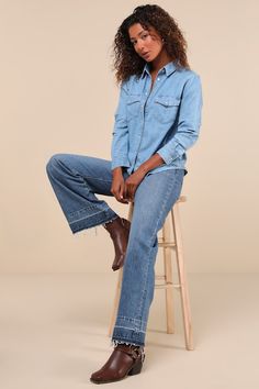 Say ""howdy"" to your new fave outfit essentialâ€”the Levi's Iconic Western Blue Chambray Pearl Snap Button-Up Top! Sturdy woven cotton chambray (in Levi's Old 517 Blue wash) shapes this classic top that has long sleeves and a collared neckline. Functional flap pockets accent the button-up bodice, which continues down to rounded hems. Cuffs, pockets, and button placket all secure with vintage-inspired pearly snaps. Fit: This garment fits true to size. Length: Size medium measures 27" from should Button Top, Chambray Shirt, Clothing Essentials, Woven Cotton, Natural Fabrics, Button Placket, Cotton Weaving, Snap Button, Chambray