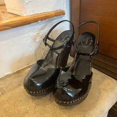 Super Cute Prada Clogs In Great Condition! I Just Took Them To The Cobbler So They Have Brand New Soles. 2 Small Scuffs On The Wood But Otherwise In Perfect Condition! 7.5 But Fits Slightly Small - Best Fit A Women’s 7 Patent Leather Mules With Padded Heel, Patent Leather Mules With Padded Heel And Round Toe, Chic Clogs With 4-inch Heel And Round Toe, Patent Leather Heels With Wooden Heel, Round Toe, Patent Leather Heels With Wooden Heel And Round Toe, Black High Heel Clogs With Padded Heel, Black Clogs With Stacked Heel For Formal Occasions, Chic Black Clogs With Padded Heel, Designer Mules With Wooden Heel And Round Toe