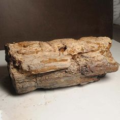 a piece of wood sitting on top of a table