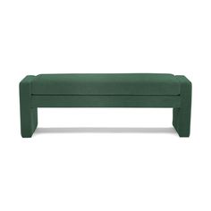 a green bench sitting on top of a white floor