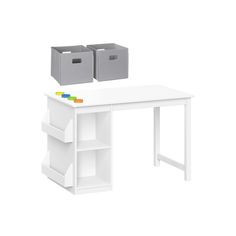 a white desk with two bins on it