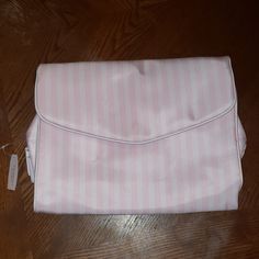 Nwt Victoria's Secret Hanging Travel Bag. Can Be Used For Travel Or At Home. Has Magnetic Closure When Folded, 2 Pockets, Removable Velcro Bag, Small Bag For Lipstick. Does Have A Couple Of Spots That May Come Out, I Didn't Try, But They Would Be On The Back Of The Bag When Hung Up. Hanging Toiletry Bag, Embellished Clutch, Victoria Secret Makeup, Small Makeup Bag, Small Cosmetic Bags, Small Makeup, Ladies Clutch, Hung Up, Victoria Secret Bags