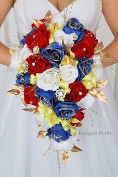 a bridal bouquet with red, white and blue flowers