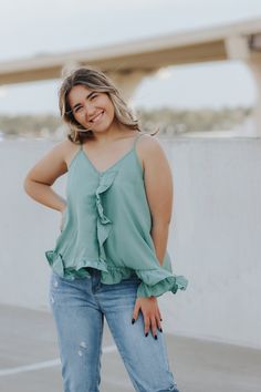 Ruffled tank top with adjustable straps. Eliza is wearing a size medium Lightweight Rayon This item is final sale. Trendy Camisole With Tank Straps For Day Out, Ruffled Camisole For Day Out, Trendy Ruffled Spaghetti Strap Camisole, Spring Tank Top With Adjustable Straps, Summer Tops With Ruffled Straps For Brunch, Summer Tank Top With Adjustable Straps For Spring, Ruffled Straps Tops For Summer Brunch, Cami Tank Top With Adjustable Straps For Brunch, Trendy Ruffled Cami Tank Top