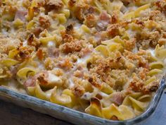 a casserole dish filled with pasta and meat