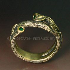 This is a theme of twigs and branches that wrap around your finger. Delicate leaves grow from the branches, and set into the tips of each branch is a 2mm round stone of your choice. Shown here are emeralds, but with no adjustment in price, you can choose from blue sapphire, yellow sapphire, pink sapphire, purple sapphire, or ruby. Diamond and moissanite are also possible, at an adjusted price. Please inquire if interested in diamond or moissanite. This ring makes a wonderful wedding band. It is Nature-inspired Hand Forged Yellow Gold Jewelry, Nature-inspired Brass Jewelry For Anniversary, Gold Hand Wrapped Nature-inspired Jewelry, Nature-inspired Hand Cast Wedding Rings, Nature-inspired Hand Cast Rings For Wedding, Branch Wedding Band, Branch Ring, Purple Sapphire, Ruby Diamond