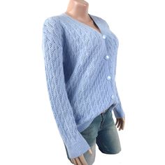 Light Blue V Neck Hollow-out Button Knit Cardigan Blue V-neck Cardigan With Buttons, Blue V-neck Sweater With Button Closure, Blue Cable Knit Cardigan For Spring, Blue Knitted V-neck Cardigan, Blue Cable Knit V-neck Cardigan, Light Blue V-neck Cardigan For Winter, Light Blue Buttoned Cardigan For Fall, Light Blue V-neck Winter Cardigan, Light Blue Long Sleeve Cardigan With Button Closure