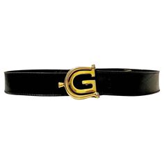 Crafted in Italy, this sleek black leather belt from Gucci boasts a lustrous gold-tone GG metal buckle. Condition: vintage, 1980s, overall good, minimal sign of wear Measurements: 85x4cm - 33x1.6in Hermes Kelly Bag, Kelly Bag, Black Leather Belt, Belt Black, Fashion Sale, Metal Buckles, Hermes Bag Birkin, Leather Belt, Fashion Art