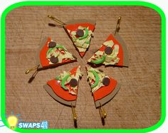 four slices of pizza sitting on top of each other in the shape of a star