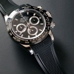 100% Vulcanized Black Ballistic Rubber Strap for Rolex Daytona 116500LN which comes on a Stainless Steel, Two-Tone, or Yellow Gold Oyster bracelet (see notes) and the OEM Rolex deployant clasp. This strap utilizes "Blocked Integration" engineering, incorporating solid inserts for a flawless, motionless flush mount to the Daytona 116500LN case*. Black Luxury Watch Bands For Formal Occasions, Formal Black Watch Bands With Bracelet Strap, Panerai Straps, Swiss Luxury Watches, Platinum Bracelet, Swiss Luxury, Luxury Watch Brands, Rubber Bracelets, Oyster Bracelet