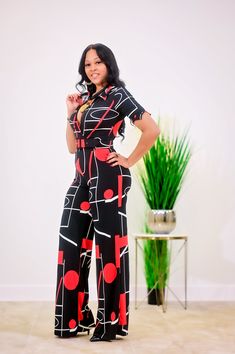 Trendy Black Short Sleeve Jumpsuits And Rompers, Red Printed V-neck Jumpsuits And Rompers, Black V-neck Jumpsuits And Rompers For Spring, Black Short Sleeve Jumpsuits And Rompers For Spring, Non-stretch V-neck Jumpsuit For Night Out, Black V-neck Jumpsuit, Casual Printed V-neck Jumpsuits And Rompers, Non-stretch V-neck Jumpsuits And Rompers For Night Out, V-neck Non-stretch Jumpsuits For Night Out