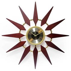 a clock that is made out of wood and has an unusual design on the face