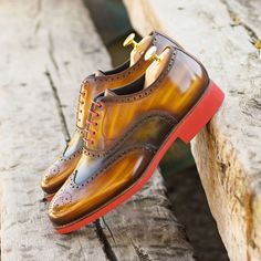 Ambrogio Bespoke Men's Shoes Cognac & Green Patina Leather Brogue Oxfords (AMB2247) Material: Patina Leather Hardware: None Color: Cognac & Green Outer Sole: Rubber Sole Hand-Painted Patina Leather Upper Wingtip Oxfords Design Create using Anticatura Method Zurigo Toe Shape Comes with box and dust bag 100% Handmade in Spain, using only the highest qualities of leathers and other materials 4954-MULTI Exclusive to Ambrogio Collection Note: This is a "Special Order" product, production takes approx Patina Style, Men's Dress Shoes, Leather Brogues, Leather Dye, Wingtip Oxford, Leather Slip On Shoes, Brogue Shoes, Men's Shoe, Clarks Originals