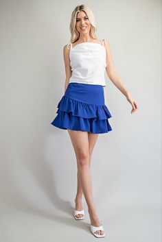 Chic Mini Length Ruffled Skort, Chic Ruffled Mini Skort, Chic Ruffle Hem Mini Skort, Chic Mini Length Skort With Ruffled Skirt, Chic Mini Skort With Ruffle Hem, Chic Mini Skort With Ruffled Skirt, Chic Flowy Mini Skirt With Layered Hem, Chic Tiered Skort With Ruffles, Chic Relaxed Fit Mini Skirt With Ruffles