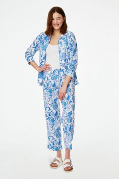 Get comfy for bedtime while looking effortlessly put together for breakfast the next morning in this pajama set. This set includes a long-sleeve button-up pajama top featuring our sophisticated Amanda print and matching pajama bottoms. The lightweight, breathable cotton ensures lasting comfort. 4 Buttons Shirt Pockets Tie Waist Materials and Care 100% 60's Cambric Cotton Machine Wash, Gentle Cycle. Line Dry. Warm Iron If Needed. Made in India Measurement Information Leah is 5'11" and wears size Spring Blue Sleepwear For Loungewear, Blue Spring Sleepwear For Loungewear, Blue Sleepwear For Spring Loungewear, Blue Sleepwear For Spring, Blue Long Pants Sleepwear For Spring, Spring Daywear Sets With Long Pants, Blue Sets For Spring Daywear, Button Up Pajamas, Matching Pajama