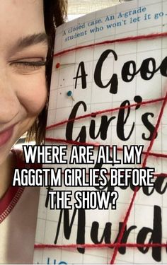 a woman holding up a book with the words where are all my agom girls before the show?