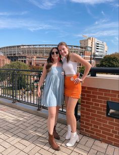 university of tennessee, utk, sec gameday inspo, orange gameday picture, orange gameday outfit, orange dress, vols, volunteers, checkered overalls, fall gameday outfit, cold weather outfit, utk football game, tennessee football, neyland stadium, tennessee orange gameday outfits, tennessee sorority photo, utk sorority, friend gameday poses, southern college trendy outfit, tailgate outfit