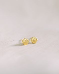 Elevate your jewelry collection with our Scallop Shell Studs. These lightweight earrings are crafted with 14k gold vermeil. Tarnish Resistant 14k Gold-filled Earrings For Gift, Tarnish Resistant 14k Gold Filled Earrings For Gift, Tarnish Resistant 14k Gold Filled Earrings As A Gift, 14k Gold Filled Earrings As Gift, Nickel-free Gold Fine Jewelry Earrings, Dainty Gold Earrings Gift For Her, Pierced Yellow Gold Earrings In Recycled Gold, Dainty Yellow Gold-plated Earrings, Tarnish Resistant 14k Gold Earrings For Gifts