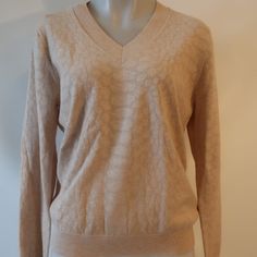 Nwt Womens Minnie Rose Beige V-Neck Pointelle Cotton Silk Sweater Xl * Retail: $209 Color: Beige Size: X-Large Pullover V-Neck Pointelle Material: 58% Viscose 30% Polybutylene 17% Nylon 3% Spandex Measurements (Flat): Shoulders: 14.7" Armpits: 18.6" Waist: 15.6" Sleeves: 24" Length: 24.5" Nwt, New With Tags. ...Mttn_golf1400-4** Elegant Cream V-neck Sweater, Fitted V-neck Sweater For Formal Occasions, Elegant Stretch V-neck Sweater, Formal Fitted V-neck Sweater, Elegant Beige V-neck Sweater, Formal V-neck Top For Winter, Black V Neck Sweater, Light Knit Sweater, Minnie Rose