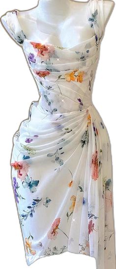 a white dress with flowers on it